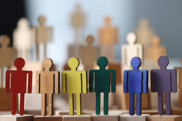 Wooden little men in lgbt colors. Sex minorities and their lifestyle concept